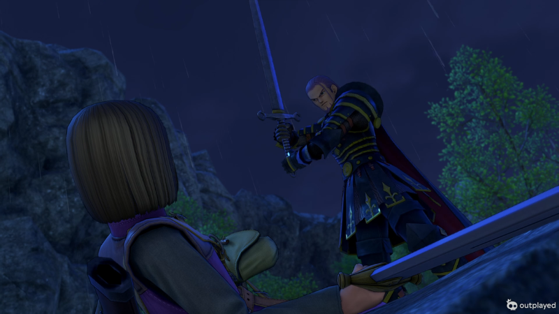 追い詰められるにとくん 尻もち着いた勇者を前に剣を掲げるグレイグ